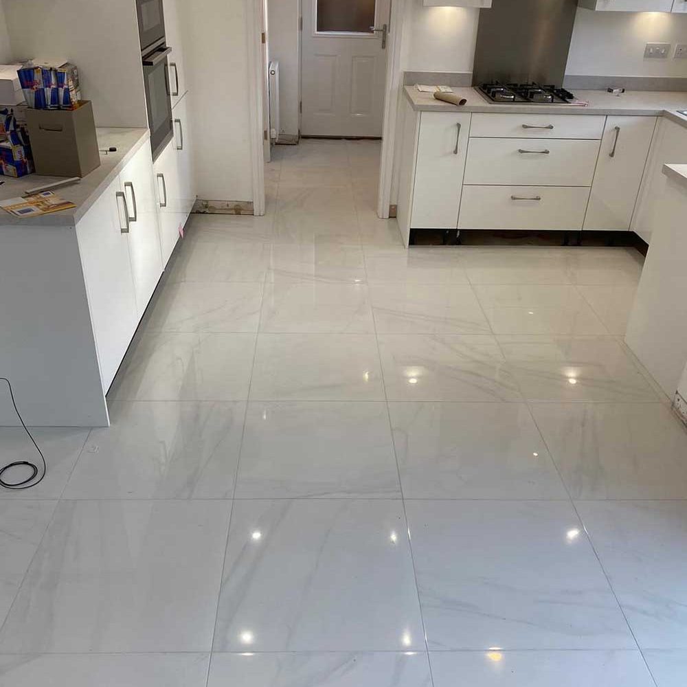 Kitchen with white marble floor tiles