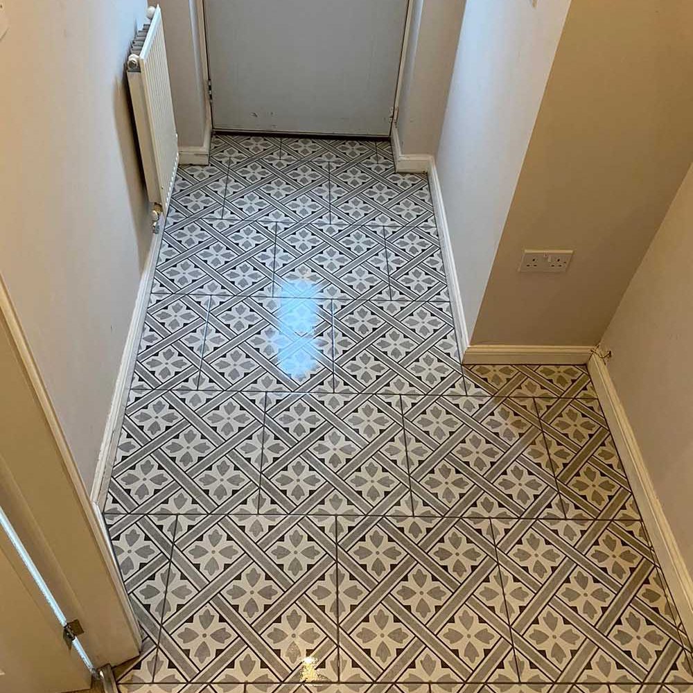 Entrance hall of a house with patterned tiles